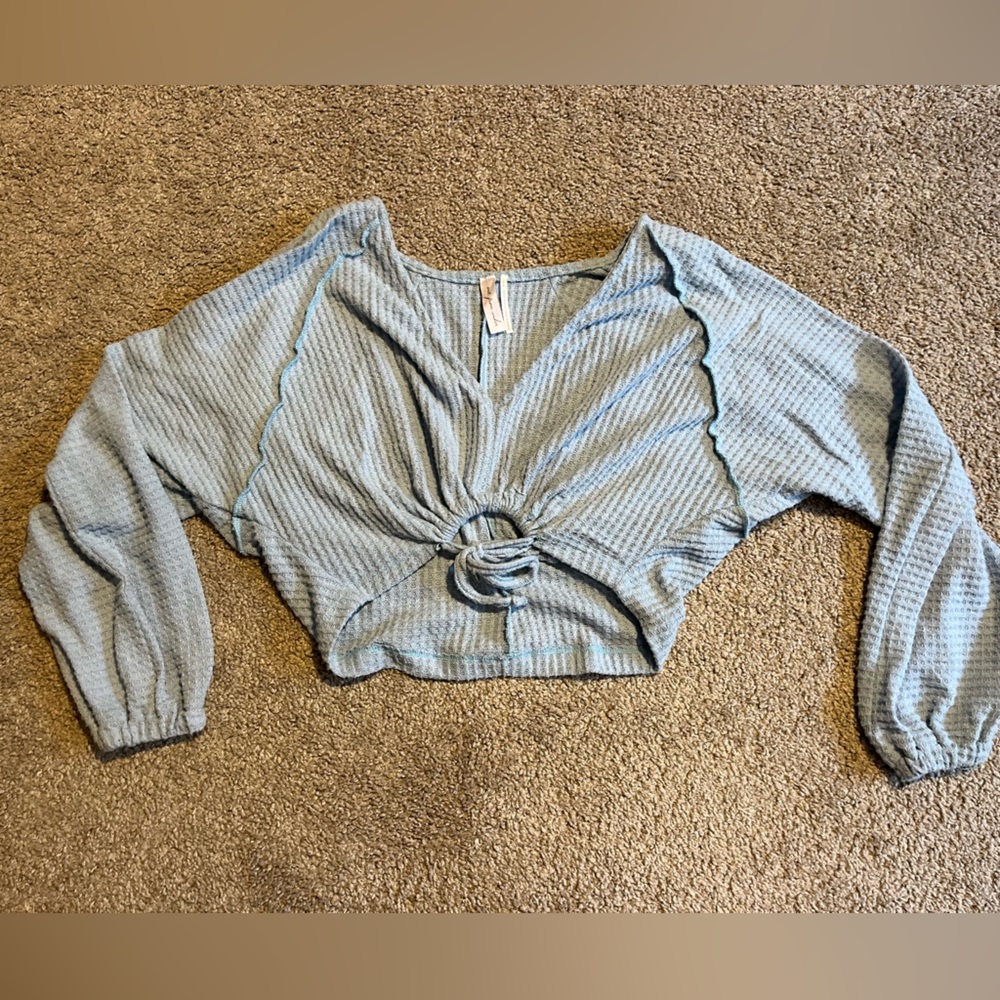 light blue sweater
